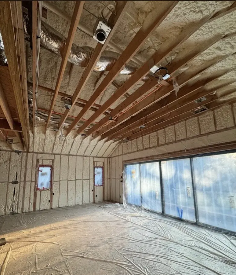 Interior walls and ceiling insulated with spray foam during new construction in Mandeville